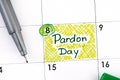 Reminder Pardon Day in calendar with pen