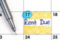 Reminder Rent Due in calendar with pen