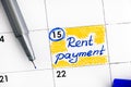 Reminder Rent Payment in calendar with blue pen. Royalty Free Stock Photo