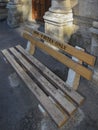 Reminder of the segregation policy with latin inscription on NON-WHITES ONLY bench in Cape Town