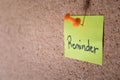 Reminder sticky notes pinned on the cork or bulletin board Royalty Free Stock Photo