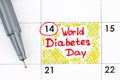 Reminder World Diabetes Day in calendar with red pen