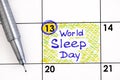 Reminder World Sleep Day in calendar with pen