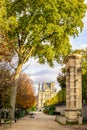 A remnant of the Tuileries palace in the Tuileries garden in Paris, France, and the Louvre palace in autumn