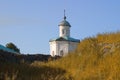 The picture remnants of the defensive moat of the fortress on the background of Constantine and Helen chapel. Solovki. Russia