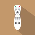 TV remote control device isolated on brown background Television technology channel surfing equipment with icon buttons. Royalty Free Stock Photo