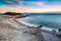 Remote beach at sunset in Greece Royalty Free Stock Photo