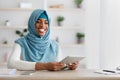 Remote Career. Portrait Of Happy Black Muslim Freelancer Lady With Digital Tablet