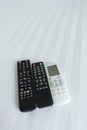 remote control on Bed linen Royalty Free Stock Photo