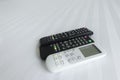 remote control on Bed linen Royalty Free Stock Photo