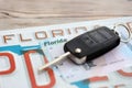 Remote control car keys on Florida license plate with driver license. Car driving in Florida Royalty Free Stock Photo