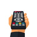 Remote control holding in hand Royalty Free Stock Photo