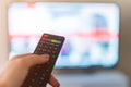 Remote control interacting with smart television Royalty Free Stock Photo
