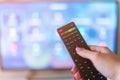 Remote control interacting with smart television Royalty Free Stock Photo