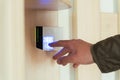 remote control panel of the security system in the apartment. entering password to activate modern alarm system Royalty Free Stock Photo