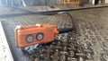 Remote control pendant switch for cargo trucks or industrial use. put on the metal floor Royalty Free Stock Photo