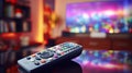 Remote control and selection of TV channels. Royalty Free Stock Photo