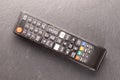 One TV remote on a slate rock , macro shot, top view. Royalty Free Stock Photo