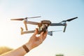 Remote controlled copter with digital camera in the hand. Closeup Royalty Free Stock Photo