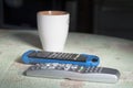 Remote Controls And Mug Royalty Free Stock Photo