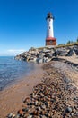 Remote Crisp Point Lighthouse on the rocky shores of Lake Superior in Michigan, USA Royalty Free Stock Photo