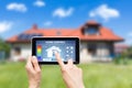 Remote home control system on a digital tablet. Royalty Free Stock Photo