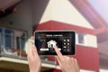 Remote home control system on a digital tablet. Royalty Free Stock Photo