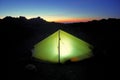 Remote And Illuminated Tent At Twilight