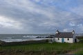 A little cottage at the edge of the Irish sea on the Welsh island of Anglesey.