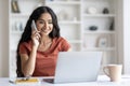 Beautiful young indian woman independent contractor working from home Royalty Free Stock Photo