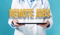 Remote Jobs theme with a doctor using a tablet pc
