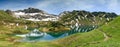 Remote lake up high in the alpine mountains. Schrecksee. Royalty Free Stock Photo