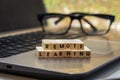 REMOTE LEARNING virtual learning concept with wood block letters on laptop Royalty Free Stock Photo