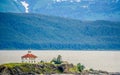 remote lighthouse island standing in the middle of mud bay alaska