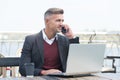 Remote management. Online service manager work in internet cafe. Sales manager make phone call to client. Running e Royalty Free Stock Photo