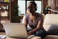 Remote student attending online courses class, typing on laptop Royalty Free Stock Photo