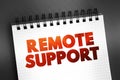 Remote Support text on notepad, concept background Royalty Free Stock Photo