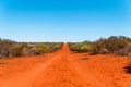 Dusty Australian outback red road, Western Australia Royalty Free Stock Photo