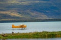 Remote travel by float plane, landing and taking off on Nak Nak lake, Katmai National Park, Alaska Royalty Free Stock Photo