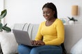 Remote Work. Cheerful Black Millennial Woman Using Laptop Computer At Home Royalty Free Stock Photo