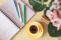 Cup of coffee and notebook Royalty Free Stock Photo