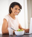 Remote work, laptop and woman eating a salad, healthy food or nutrition in home and office. Happy, portrait and working Royalty Free Stock Photo