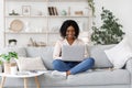 Remote Work. Millennial african american woman working on laptop at home Royalty Free Stock Photo