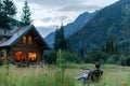 Remote Work in Mountain Cabin, Serene Nature, Productive Workspace, Inspiring Views, Tranquil Setting, Peaceful Atm Royalty Free Stock Photo