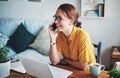 Remote work, phone and woman employee on a call happy about conversation on a cellphone in her home or house. Laptop