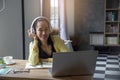 Remote working and meeting at Home office Concept. Businesswoman working online via laptop. Asian young entrepreneurs watching Royalty Free Stock Photo