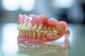 Removable denture, dentures on the desktop. Dental care Royalty Free Stock Photo