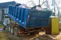 Removal of debris construction waste building demolition with rock and concrete rubble on portable bio-toilets Royalty Free Stock Photo