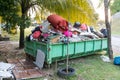 Removal rubbish dumpster bin with load of material for disposal Royalty Free Stock Photo