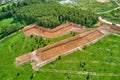 Removal of the top layer of earth overburden for the development of a sand pit Royalty Free Stock Photo